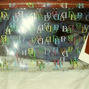 Dooney and Bourke clear cosmetic travel case